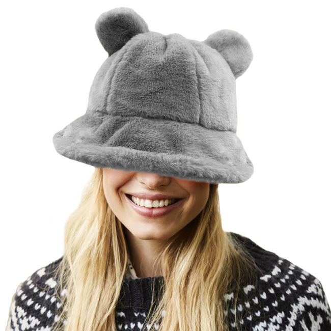 Gray Faux Fur Bear Ear Bucket Hat, Show your excellent choice with this chic Faux Fur bear Bucket Hat. This animal themed bucket hat is nicely designed and a great addition to your attire. Have fun and look Stylish anywhere outdoors. Great for covering up when you are having a bad hair day. Perfect for protecting you from the wind, snow, beach, pool, camping, or any outdoor activities in cold weather. Amps up your outlook with confidence with this trendy bucket hat. 