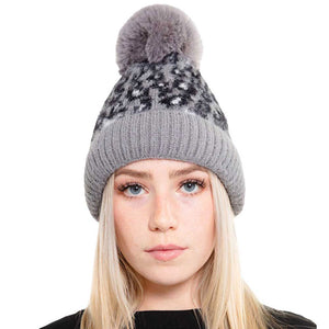Gray Leopard Patterned Fuzzy Fleece Pom Pom Beanie Hat. The winter hats for women is made of high-quality material, safe and harmless, soft, warm, breathable and comfortable to wear. Accessorize the fun way with this leopard themed pom pom beanie hat, the autumnal touch you need to finish your outfit in style. Awesome winter gift accessory! Perfect Gift Birthday, Christmas, Holiday, Anniversary, Valentine’s Day, Loved One.