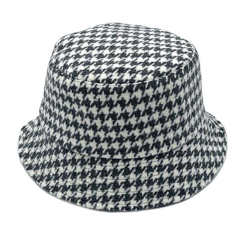 Gray Polyester Houndstooth Patterned Bucket Hat, this bucket hat doubles as a rain hat and is snug on the head and stays on well. It will work well to keep the rain off the head and out of the eyes and also the back of the neck. Wear it to lend a modern liveliness above a raincoat on trans-seasonal days in the city.