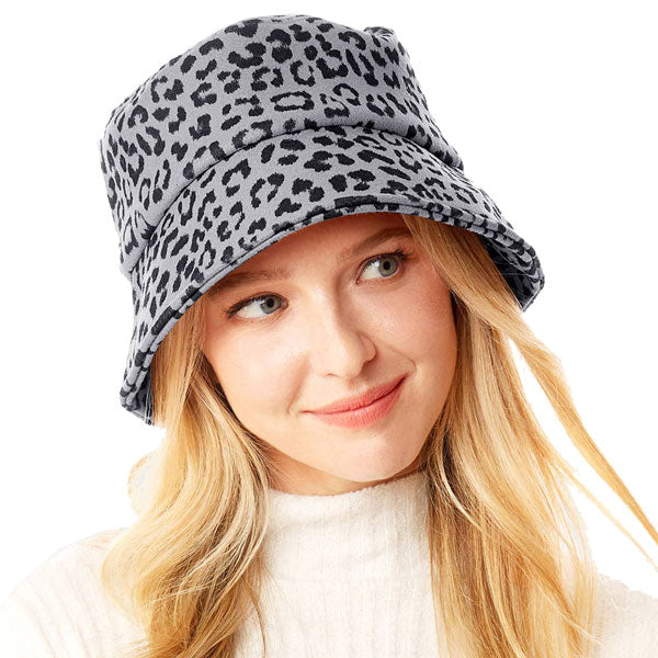Gray Polyester One Size Leopard Patterned Bucket Hat. Show your trendy side with this chic animal print hat. Have fun and look Stylish. Great for covering up when you are having a bad hair day, perfect for protecting you from the sun, rain, wind, snow, beach, pool, camping or any outdoor activities.