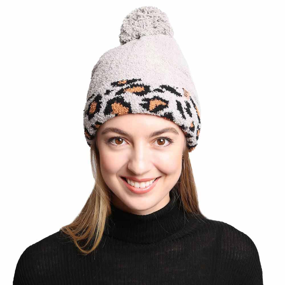 Gray Solid Color Linked Leopard Accented Pom Pom Beanie, accessorize the fun way with this leopard-designed beanie to receive compliments. The autumnal touch you need to finish your outfit and ensure maximum comfort and durability with perfect style. It keeps you warm, toasty, and totally unique everywhere. Awesome winter gift accessory for Birthday, Christmas, holidays, anniversaries, and Valentine’s Day to your friends, family, and loved ones. Enjoy the season!