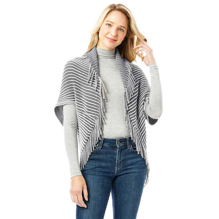 Gray Striped Chenille Shrug With Fringe, is complete protection from cold weather and chill that fits with any of your outfits easily and makes your outfit absolutely lucrative. Different color variation makes it more attractive. It's easy to put on and off. This soft patterned shrug gives you a unique yet beautiful look. It ensures your upper body keeps perfectly toasty when the temperatures drop.