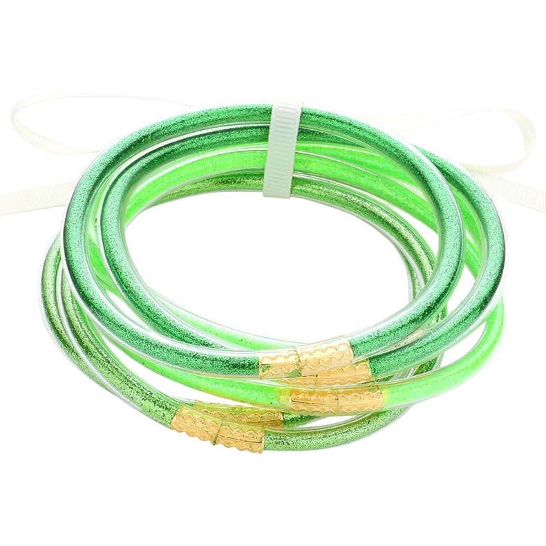 Green 6PCS Glitter Jelly Tube Bangle Bracelets, are a beautiful & unique collection to your attire to make your look more attractive. Wear these beautiful glitter bracelets as formal or casual wear to make you stand out at a party, work, or shopping. The bracelet is filled with enough glitter & it sparkles in the light. These beautiful bracelets will help you to get more compliments on your everyday wear