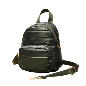 Green Solid Puffer Mini Backpack Bag, Great for adding fashionable accents to your daily style. This mini bag offers enough room for your daily going essentials. It can hold your wallets, keys, cell phones, makeup and other small accessories and stuff. Mini size and lovely decoration make your look chic and fashionable. These beautiful and trendy backpacks have adjustable hand straps that make your life more comfortable.