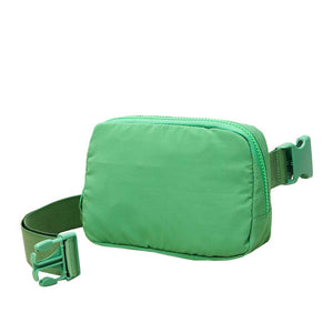 Green Solid Puffer Sling Bag, show your trendy side with this awesome solid puffer sling bag. It's great for carrying small and handy things. Keep your keys handy & ready for opening doors as soon as you arrive. The adjustable lightweight features room to carry what you need for those longer walks or trips. These Puffer Sling Bag packs for women could keep all your documents, Phone, Travel, Money, Cards, keys, etc., in one compact place, comfortable within arm's reach. Stay comfortable and smart. 