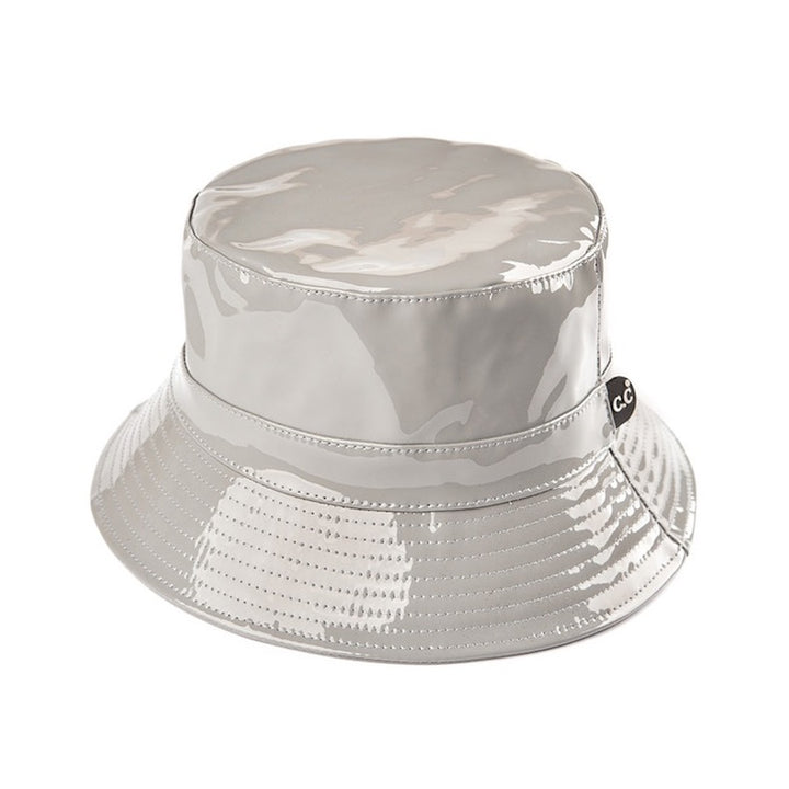 Grey C.C Brand Shiny Solid Color Reflective Enamel Detailed Rain Bucket Hat; this rain hat is snug on the head and works well to keep rain off the head, out of eyes, and also the back of the neck. Wear it to lend a modern liveliness above a raincoat on trans-seasonal days in the city. Perfect Gift for fashion-forward friend