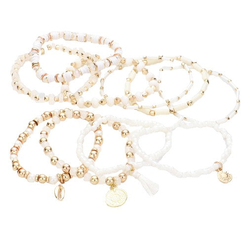 Ivory 10pcs Pearl Multi Bead Puka Shell Coin Tassel Stretch Layered Stackable Bracelets; these stackable bracelets can light up any outfit, and make you feel absolutely flawless, while adding a pop of color to your ensemble. Perfect Birthday Gift, Anniversary Gift, Mother's Day Gift, Thank you Gift, Loved One Gift, Just Because Gift