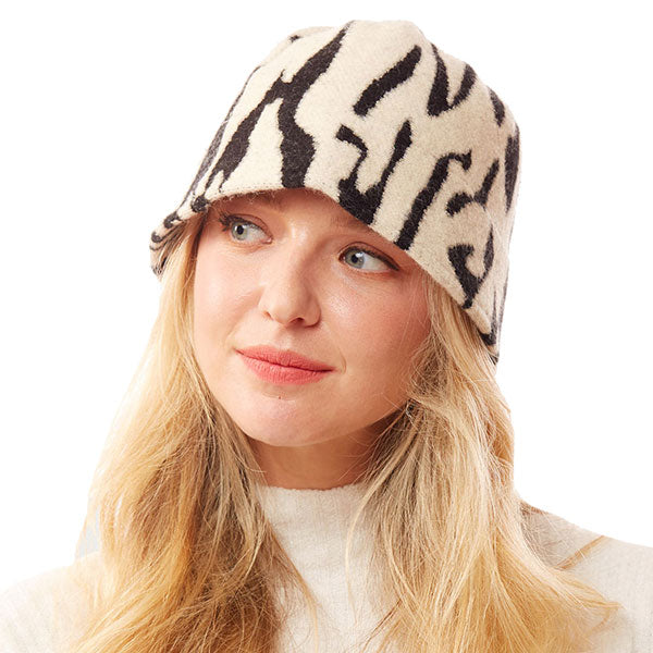 Ivory Animal Patterned Soft Fabric Bucket Hat. Show your trendy side with this chic animal print hat. Have fun and look Stylish. Great for covering up when you are having a bad hair day, perfect for protecting you from the sun, rain, wind, snow, beach, pool, camping or any outdoor activities.