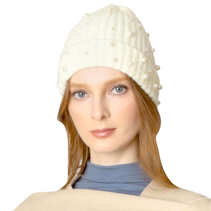 Ivory Beautiful Pearl Beanie Hat, you’ll want to reach for this toasty beanie to keep you incredibly warm and show your trendy choice off. Whenever you wear this beanie hat, you'll look like the ultimate fashionista with the royal look of accented pearl theme. Accessorize the fun way with this pom hat which gives you the autumnal touch needed to finish your outfit in style. Beautiful winter gift accessory and Perfect Gift for Birthdays, Christmas, holidays, anniversaries, Valentine’s Day, etc. 