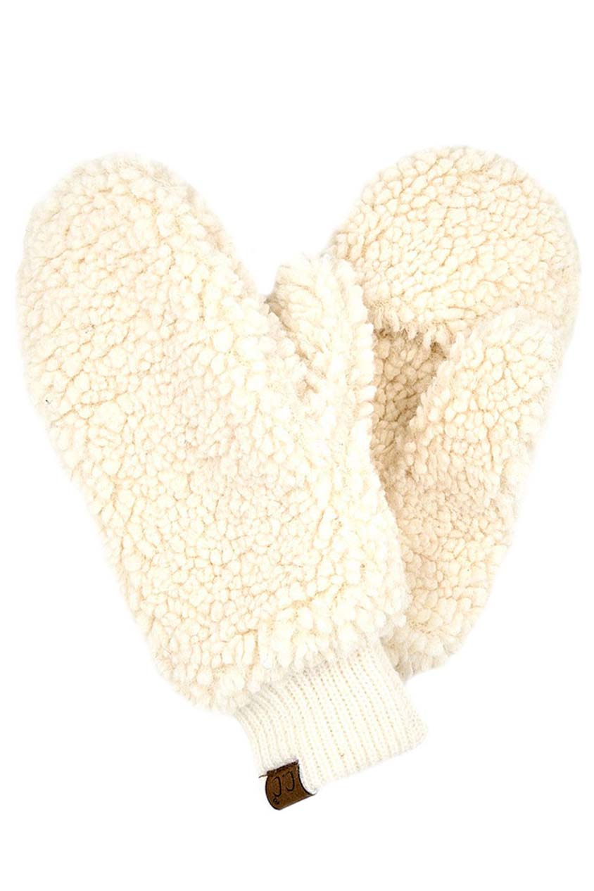 Ivory C C Sherpa Mitten Gloves, are a smart, eye-catching, and attractive addition to your outfit. These trendy gloves keep you absolutely warm and toasty in the winter and cold weather outside. Accessorize the fun way with these gloves. It's the autumnal touch you need to finish your outfit in style. A pair of these gloves will be a nice gift for your family, friends, anyone you love, and even yourself.