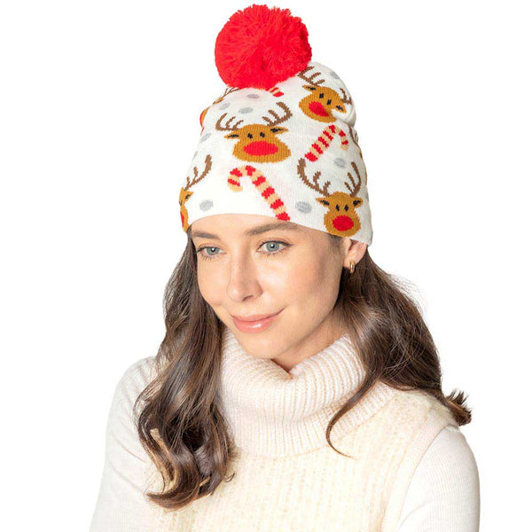 Ivory Christmas Reindeer Candy Cane Pom Knit Beanie Hat, The Christmas reindeer themes beanies are so adorably and fun. Let's Celebrate the holiday season as soon as the temperature drops with this festive hats. Whether it's a chic holiday dress or dressing up as an elf, this hat is versatile. A super cute and stylish way to show your holiday spirit with a Christmas accent added to any outfit. Excellent winter gift accessory! Perfect Gift Birthday, Christmas, Stocking Stuffer, Secret Santa etc.