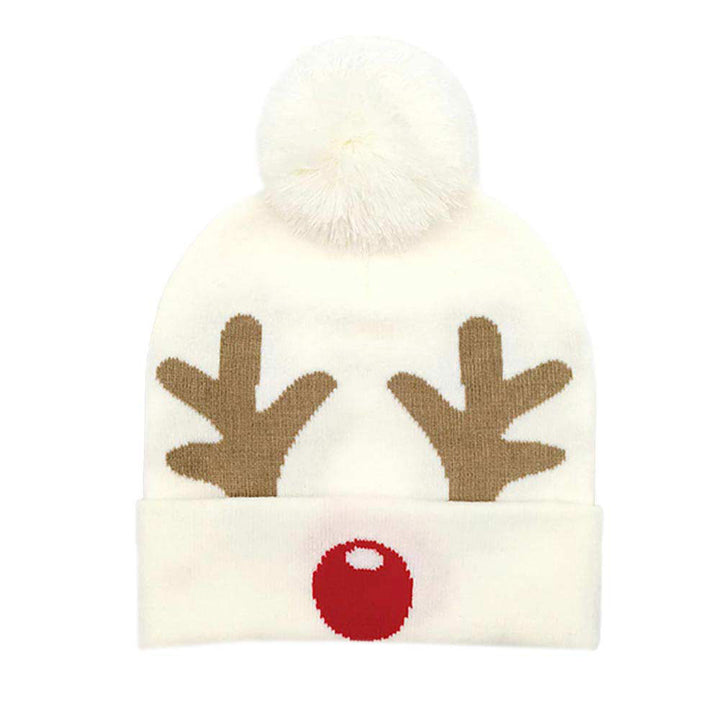 Ivory Christmas Reindeer Pom Knit Beanie Hat, It's the ideal time to add some new flair to your wardrobe because Christmas is almost here. These festive beanies will look great on the slopes or at the ice rink. These beanie will make the perfect accessory for your Christmas sweater too. In the chilly winter, there's nothing warmer than a happy holiday. Celebrate your joy with this festive Reindeer pom-pom beanie hat! Stay warm and look festive with a jolly new fab beanie!