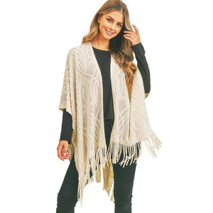 Ivory Embossed Pattern Tassel Ruana, beautifully decorated with embossed style and in different colors to accent the gorgeous look in a classy manner. It's the perfect accessory for the winter while running out the door into the cold air. It's a luxurious, trendy, super soft chic capelet that keeps you warm and toasty. You can throw it on over so many pieces elevating any casual outfit! Perfect Gift for Wife, Mom, Birthday, Holiday, Christmas, Anniversary, Fun Night Out.