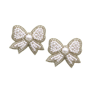 Ivory Felt Back Pearl Seed Beaded Bow Earrings. perfect for the festive season, embrace the occasion spirit with these cute enamel Bow Earrings, these sweet delicate gift earrings are sure to bring a smile to your face. Surprise your loved ones on beautiful occasion. Great gift idea for Wife, Mom, or your Loving One.