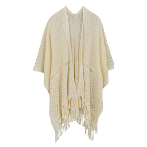 Ivory Geometry Open Knit Ruana With Fringe. With this lovely ruana shawl, you can draw attention to the contrast of different outfits. Geometry Pattern With Fringe Design that Gives it a unique decorative and modern look. Match well with jeans and T-shirts or vest, A fashionable eye catcher, will quickly become one of your favorite accessories, warm and goes with all your winter outfits.