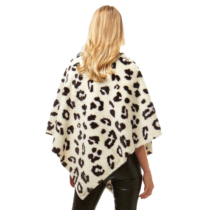 Ivory Leopard Pattern Faux Fur Poncho, warm pullover ladies animal print trim poncho makes the perfect fashion statement this winter, Slip this on to add instant gorgeousness to your look! Stay warm, cozy & stylish in this beautiful piece.