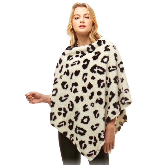 Ivory Leopard Pattern Faux Fur Poncho, warm pullover ladies animal print trim poncho makes the perfect fashion statement this winter, Slip this on to add instant gorgeousness to your look! Stay warm, cozy & stylish in this beautiful piece.