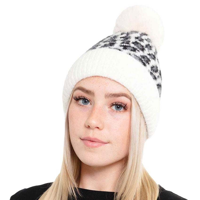 Ivory Leopard Patterned Fuzzy Fleece Pom Pom Beanie Hat. The winter hats for women is made of high-quality material, safe and harmless, soft, warm, breathable and comfortable to wear. Accessorize the fun way with this leopard themed pom pom beanie hat, the autumnal touch you need to finish your outfit in style. Awesome winter gift accessory! Perfect Gift Birthday, Christmas, Holiday, Anniversary, Valentine’s Day, Loved One.
