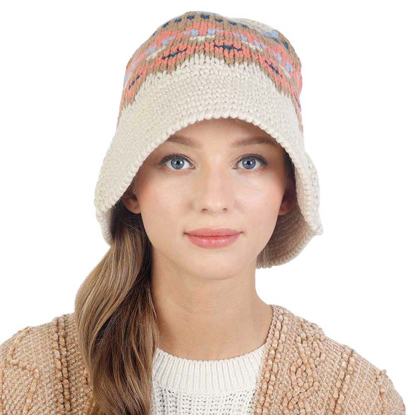Ivory Nordic Pattern Knitted Bucket Hat, is a beautifully designed Nordic pattern that enriches your attire and amps up your outlook in an attractive way. Have fun and look Stylish anywhere outdoors. Great for covering up when you are having a bad hair day. Perfect for protecting you from the sun, rain, wind, snow, beach, pool, camping, or any outdoor activities. Accent your confidence and beauty with this beautiful bucket hat.