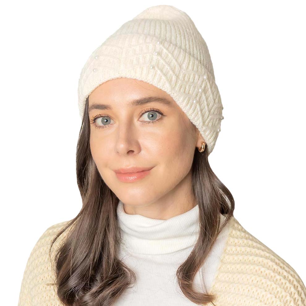 Ivory Pearl Beanie Hat, you’ll want to reach for this toasty beanie to keep you incredibly warm. Whenever you wear this beanie hat, you'll look like the ultimate fashionista with the royal look of accented pearl. Accessorize the fun way with this pom hat which gives you the autumnal touch needed to finish your outfit in style. Excellent winter gift accessory and Perfect Gift for Birthdays, Christmas, holidays, anniversaries, Valentine’s Day, etc. Have a cozy & warm winter!