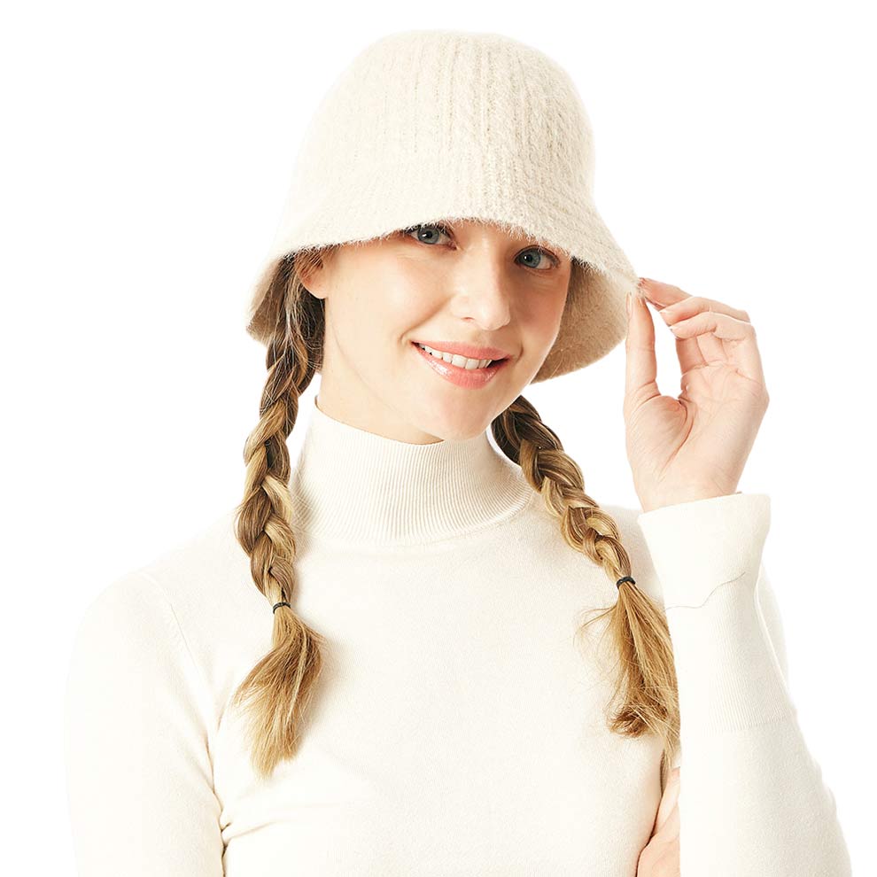 Ivory Soft Cable Knit Solid Bucket Hat, show your trendy side with this Knit Bucket Hat. Adds a great accent to your wardrobe. This elegant, timeless & classic Bucket Hat looks fashionable. Perfect for a bad hair day, or simply casual everyday wear.  Accessorize the fun way with this Solid bucket hat. It's the autumnal touch you need to finish your outfit in style. Awesome winter gift accessory for that fashionable on-trend friend.