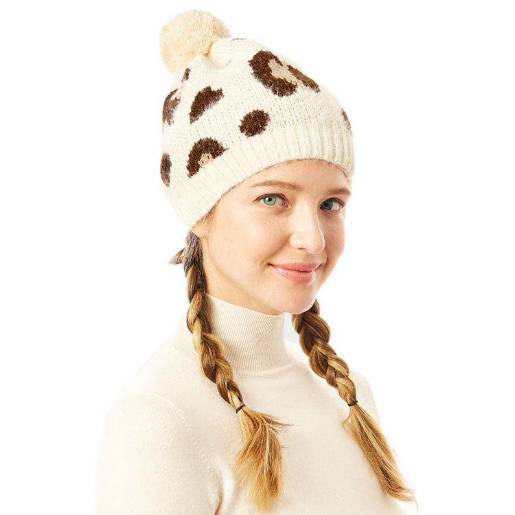 Ivory Soft Fuzzy Leopard Print Beanie Hat With Pom Pom, before running out the door into the cool air, you’ll want to reach for this toasty beanie to keep you incrediblywarm. Accessorize the fun way with this faux fur pom pom hat, these leopard themed beanie hat have the autumnal touch you need to finish your outfit in style. Awesome winter gift accessory! Perfect Gift Birthday, Christmas, Stocking Stuffer, Secret Santa, Holiday, Anniversary, Valentine's Day, Loved One.