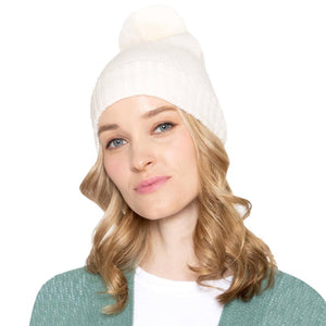 Ivory Solid Knit Beanie Hat With Faux Fur Pom, accessorize the fun way with this faux fur pom solid knit beanie hat to keep yourself warm and toasty and enrich your beauty with luxe. The autumnal touch you need to finish your outfit in style. Awesome winter gift accessory! Perfect Gift for Birthdays, Christmas, holidays, anniversaries, and Valentine’s Day to your friends, family, and Loved Ones. 