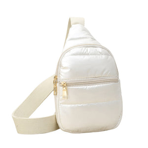 Ivory Solid Puffer Mini Sling Bag, be the ultimate fashionista while carrying this Solid Puffer Sling bag in style. It's great for carrying small and handy things. Keep your keys handy & ready for opening doors as soon as you arrive. The adjustable lightweight features room to carry what you need for long walks or trips.