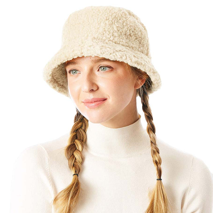 Ivory Teddy Bear Bucket Hat, show your trendy side with this cute Teddy Bear Bucket Hat. Adds a great accent to your wardrobe. This elegant, timeless & classic Bucket Hat is fashionable & perfectly fits with any outfit. Perfect for a bad hair day, or simply casual everyday wear.  Accessorize the fun way with this beautiful bucket hat. It's the autumnal touch you need to finish your outfit in style.