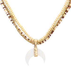 Ivory Wood Heishi Beaded Pendant Triple Layered Pendant Necklace. Stylish and fashionable, this simple lovely pendant necklace is the ultimate way to elevate your style while adding a touch of sophistication to your look. Inspiring jewelry works with every look. It is a subtle way to inspire others and keep your chic style. Perfect Birthday Gift, Anniversary Gift, Mother's Day Gift, Anniversary Gift, Graduation Gift, Prom Jewelry, Thank you Gift.