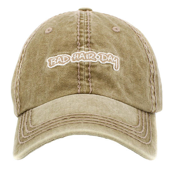 Khaki BAD HAIR DAY Vintage Baseball Cap. Fun cool message themed vintage baseball cap. Perfect for walks in sun, great for a bad hair day. The distressed frayed style with faded color gives it an awesome vintage look. Soft textured, embroidered message with fun statement will become your favorite cap.