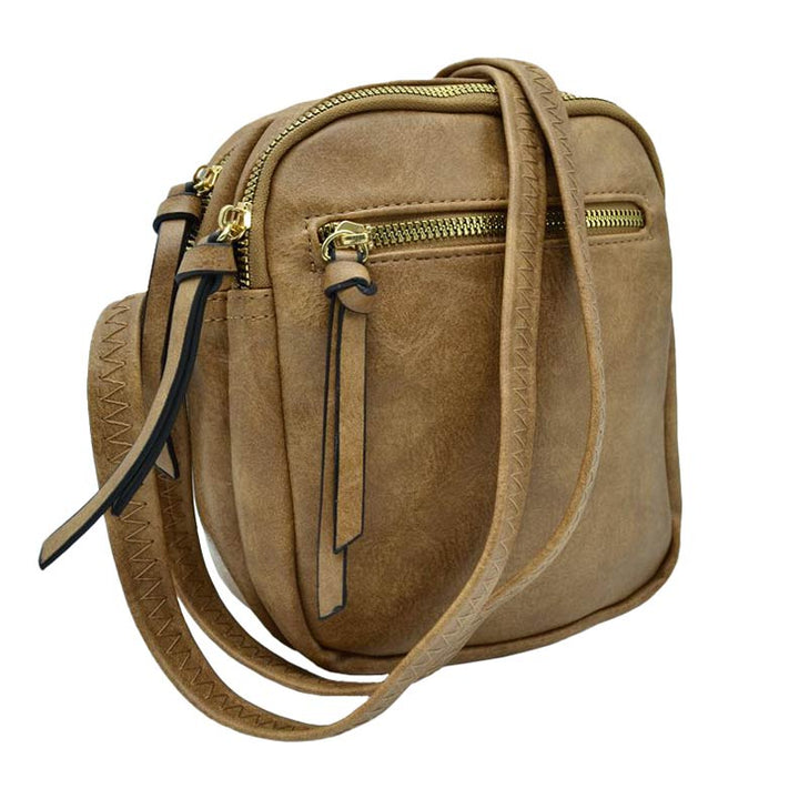 Khaki Trendy Leather Crossbody Bag With Shoulder Strap, Be trendy and casual with this beautifully crafted crossbody bag. This premium-looking bag is made up of genuine leather, making it perfect for carrying when heading to the office or casual parties. This bag features a flexible shoulder strap and zipper closure and has spacious space to place all your stuff. Stay trendy!