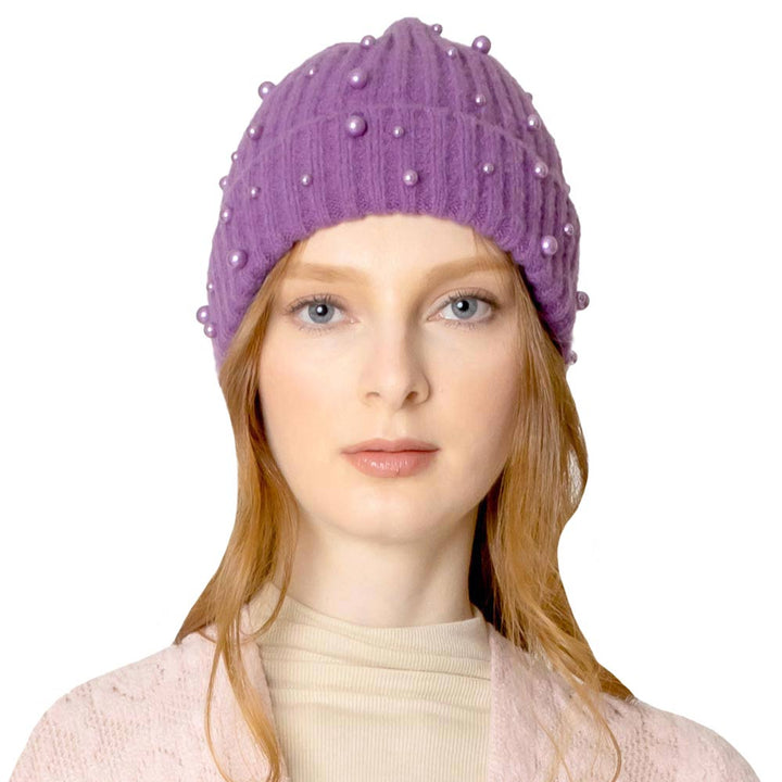 Lavender Beautiful Pearl Beanie Hat, you’ll want to reach for this toasty beanie to keep you incredibly warm and show your trendy choice off. Whenever you wear this beanie hat, you'll look like the ultimate fashionista with the royal look of accented pearl theme. Accessorize the fun way with this pom hat which gives you the autumnal touch needed to finish your outfit in style. Beautiful winter gift accessory and Perfect Gift for Birthdays, Christmas, holidays, anniversaries, Valentine’s Day, etc. 