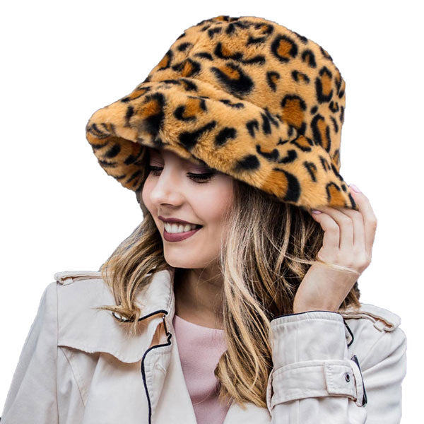 Leopard Patterned Faux Fur Bucket Hat, stay warm and cozy, protect yourself from the cold, this most recognizable look with remarkable bold, soft & chic bucket hat, features a rounded design with a short brim. The hat is foldable, great for daytime. Perfect Gift for cold weather!