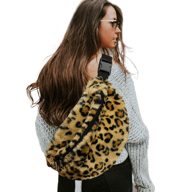 Leopard Solid Faux Fur Sling Bag, be the ultimate fashionista when carrying this Faux Fur Sling bag in style. It's great for carrying small and handy things. Keep your keys handy & ready for opening doors as soon as you arrive. The adjustable lightweight features room to carry what you need for those longer walks or trips. These fanny packs for women could keep all your documents, Phone, Travel, Money, Cards, keys, etc in one compact place, and comfortable within arm's reach.