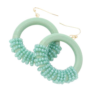 Mint Faceted Bead Wrapped Open Wood Circle Dangle Earrings, Put on a pop of color to complete your ensemble in perfect style with these gorgeous bead-wrapped wood circle earrings. The beautifully crafted design adds a gorgeous glow to any outfit with these wrapped wood circle earrings. Perfect for adding just the right amount of shimmer & shine on any occasion.