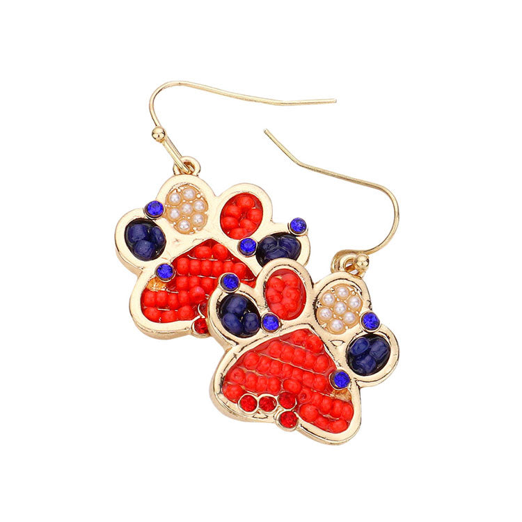 Multi American USA Flag Paw Dangle Earrings.  Show your love for our country with this sweet patriotic USA flag style American Flag dangle Earrings. Featuring red, white and blue stars and for a bit of fashionable fireworks flair. Enhance your attire with these vibrant artisanal earrings to show off your fun trendsetting style. Great gift idea for your Loving One.