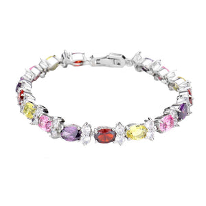 Multi CZ Round Oval Cluster Evening Bracelet. With its elegant design, this bracelet adds a feminine accent to any style. Pair it with your casual or formal attire. Get ready with these bright stunning fashion bracelets, put on a pop of shine to complete your ensemble. These CZ cluster bracelets are perfect for Party, Wedding and Evening.