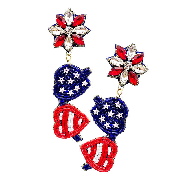 Multi Felt Back American USA Flag Sunglasses Dangle Earrings. Show your love for our country with this sweet patriotic USA flag style American Flag Earrings. Featuring red, white and blue for a bit of fashionable fireworks flair. The earrings will become a wonderful addition to any jewellery collection. Show your patriotic devotion, and look and feel great with these designer earrings!