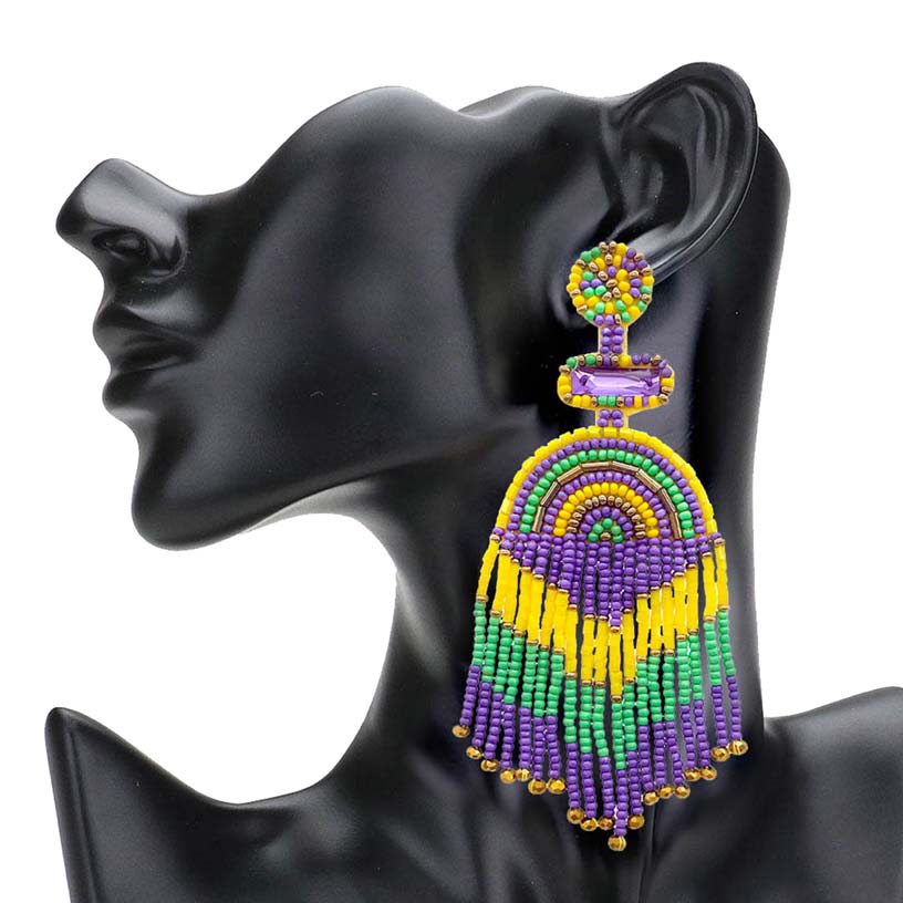 Multi Felt Back Mardi Gras Seed Beaded Fringe Earrings, are beautifully designed for Mardi Gras on a fringe style to put on a pop of color and complete your ensemble. Perfect for adding the perfect beauty & glamor everywhere with these seed-beaded earrings. These felt-back seed beaded dangle earrings are handcrafted jewelry that fits your lifestyle. Coordinate these earrings with any ensemble from business casual to everyday wear.