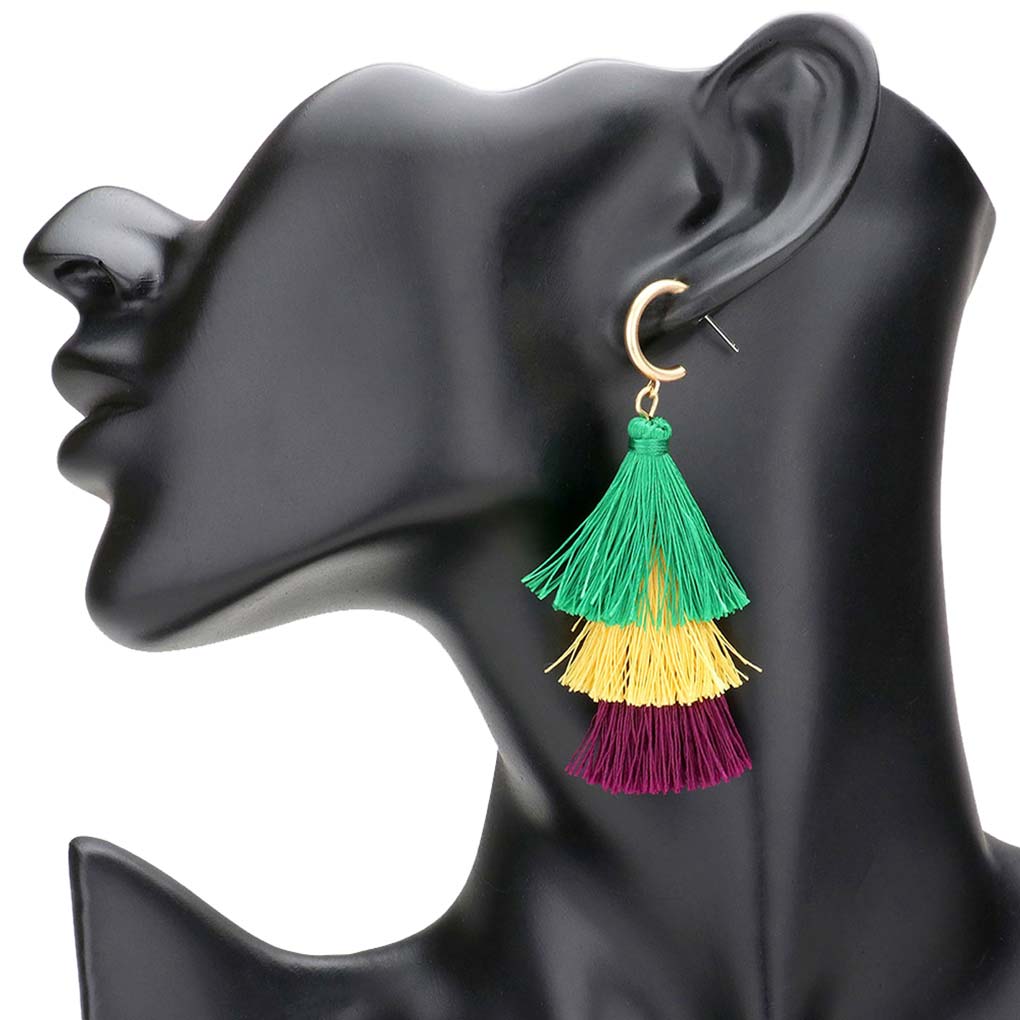 Multi Mardi Gras Metal Hoop Triple Layered Tassel Dangle Earrings, are beautifully designed for Mardi Gras on a tassel theme to put on a pop of color and complete your ensemble. Perfect for adding the perfect beauty & glamor everywhere with these metal hoop earrings. These triple-layered tassel earrings are handcrafted jewelry that fits your lifestyle. Coordinate these earrings with any ensemble from business casual to everyday wear.