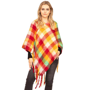 Multi Trendy Plaid Check Patterned Poncho, is absolutely beautiful wear to make you stand out and keep you warm and toasty in the cold weather or winter. It ensures your upper body keeps perfectly toasty when the temperatures drop. It's the timelessly beautiful poncho that gently nestles around the neck and feels exceptionally comfortable to wear. Attractive and eye-catchy fashion wear that will quickly become one of your favorite accessories for daily wear in winter.