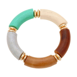Multi Wood Stretch Bracelet, a pop of color with our assortment of beautiful bracelets. Fun wood bracelet awesome for this season, The wood bracelet is an excellent way to exhibit stylish fashion and convey an affirming sense of tranquility. It's the perfect accessory to complement your outfit with style! Great as a gift for your beloved one!