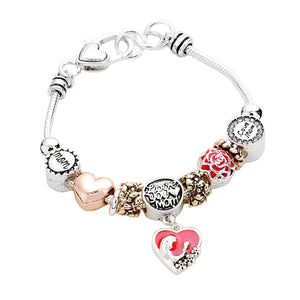 Multi Worn ( Gold Silver) Love you Mom Charm Multi Bead Bracelet. Make your mom feel special with this gorgeous Infinity Bracelet gift! Show mom how much she is appreciated & loved. This piece is versatile and goes with practically anything! This mom's bracelet is the best appreciation gift and regards to love, sacrifice, pain and care both given and taken in playing her role of mother in the family. Perfect Mother's Day gift for all the special women in your life, be it mother, wife, sister or daughter..