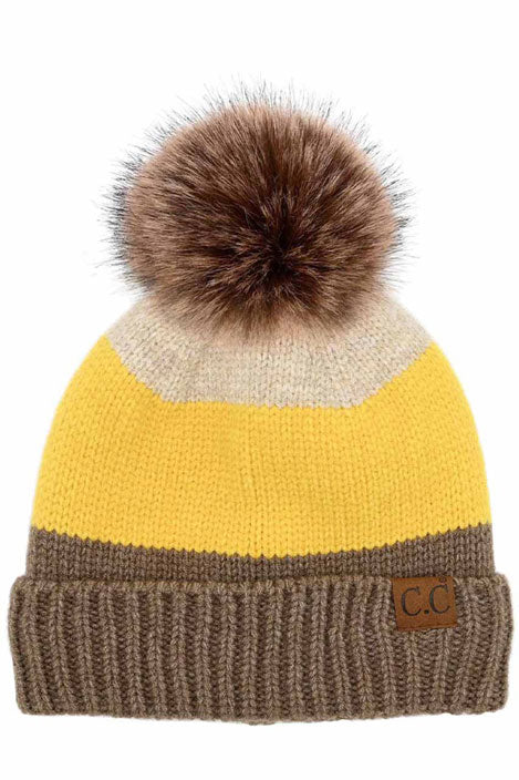 Mustard C.C Multi Color Block Stripes Pom Beanie, wear it before running out the door into the cool air to keep yourself warm and toasty and look absolutely beautiful. You’ll want to reach for this toasty beanie to keep you incredibly warm everywhere and every occasion. Accessorize the fun way with this pom hat. It's the autumnal touch you need to finish your outfit in style.