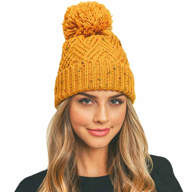 Mustard Confetti Diagonal Stripes Pompom Knit Beanie, awesome stripes design with yarn pompom makes it beautiful and keeps you standing out with perfect beauty. Wear throughout the winter and cold days to ensure absolute comfortability. Accessorize the fun way with this faux fur pom pom hat. Coordinate with any outfit to match the best with perfect warmth and coziness. It Comes in one size winter cap with a pom that fits most head sizes. Enjoy the winter in comfort with this Heart Beanie!