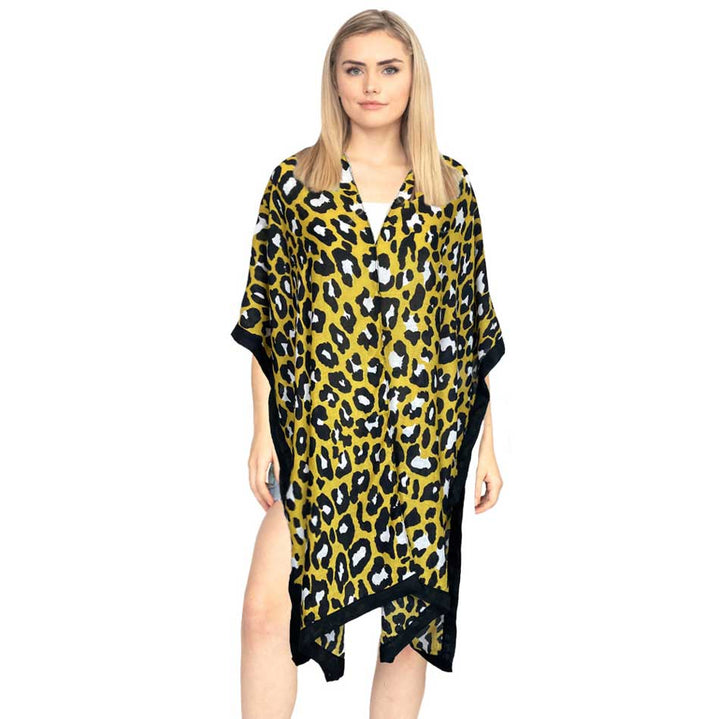 Mustard Leopard Print Kimono Leopard Print Cover Up Poncho Leopard Print Poncho, open front and a flowy silhouette. Wear over your favorite blouse and slacks to show off your trendsetting style. Throw it over you bathing suit 