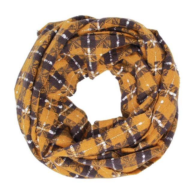 Mustard Plaid Check Infinity Super Soft Scarf, is a beautiful addition to your attire. The attractive plaid pattern makes this scarf awesome to amp up your beauty to a greater extent. It perfectly adds luxe and class to your ensemble. Absolutely amplifies the glamour with a plush material that feels amazing snuggled up against your cheeks. It's a versatile choice and can be worn in many ways with any outfit. A beautiful gift for your Wife, Mom, and your beloved ones