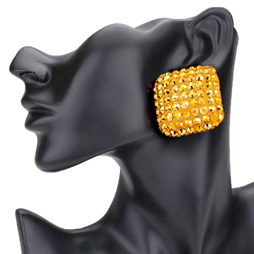 Mustard Stone Embellished Rhombus Earrings, elegance becomes you in these shiny glamorous stone embellished earrings. The perfect sparkling accessory to add sophisticated luxe and a touch of perfect class to your next social event. Coordinate these rhombus earrings with any ensemble from business casual wear. Coordinate every outfit with beauty and gorgeousness. Stay classy!
