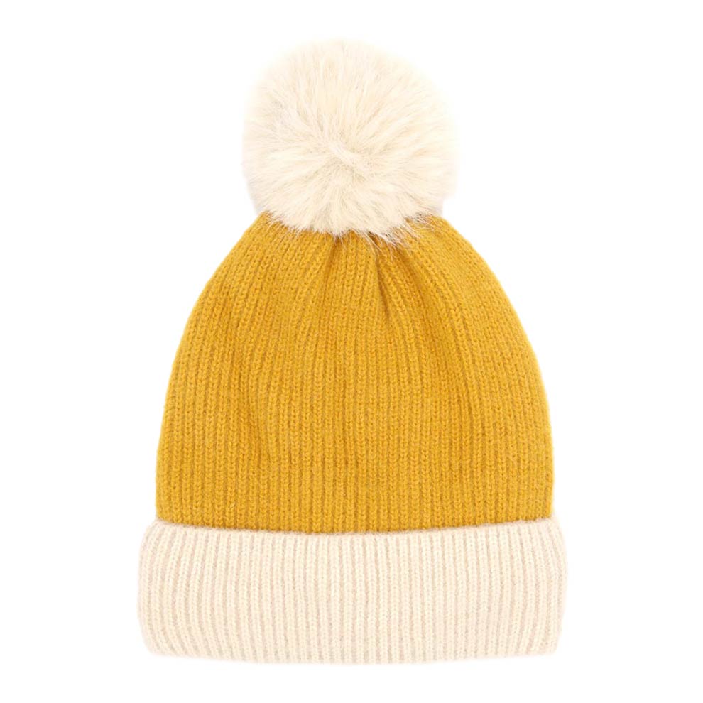 Mustard Two Tone Knit Pompom Beanie Hat, wear this beautiful pompom Beanie Hat before running out the door into the cool air. It will keep you incredibly warm and toasty on cold days and winter. Accessorize the fun way with this beanie hat to not only get the warmth but also get compliments due to its eye-catchy look. It's the autumnal touch that you need to finish your outfit in style. Beautiful winter gift accessory!